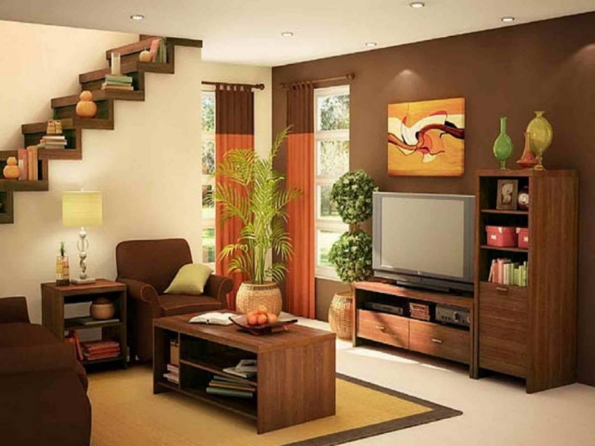 trang-tri-phong-khach-nho-abstract-painting-combine-with-classic-bookshelves-and-two-tone-wall-paint-and-decorative-dark-brown-sofa-under-staircase