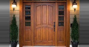 noi-that-gia-re-hcm-cropped-classy-exterior-door-design-with-wood-material-using-double-crippled-sidelite-windows-and-carved-header-for-elegant-touch-54d335c271e86